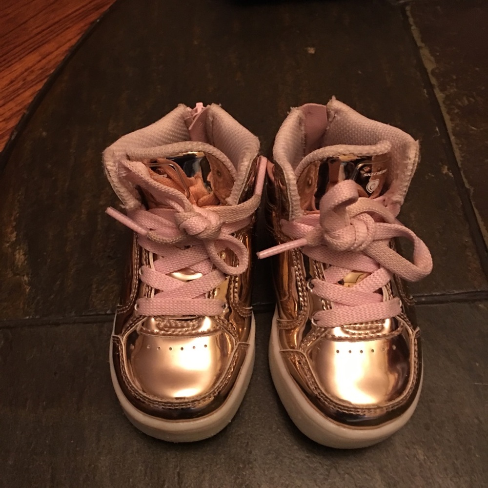 Good used condition girls rose gold sketchers
